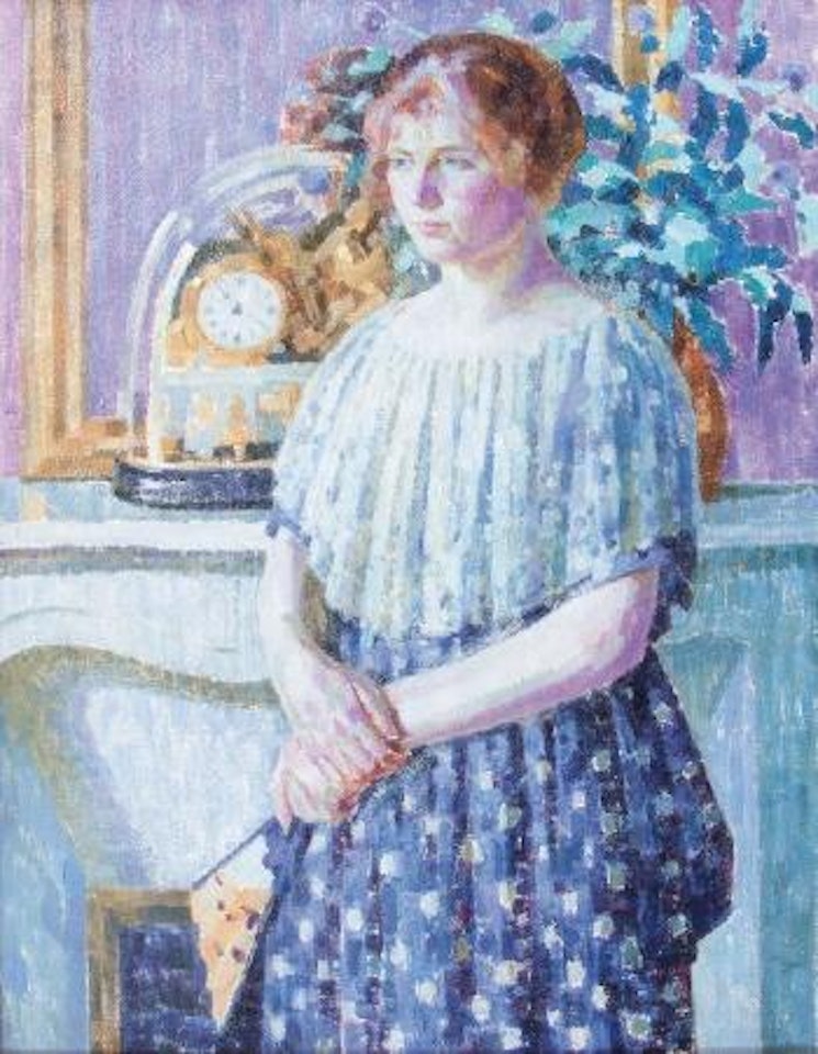 Woman before a fireplace by Louis Ritman
