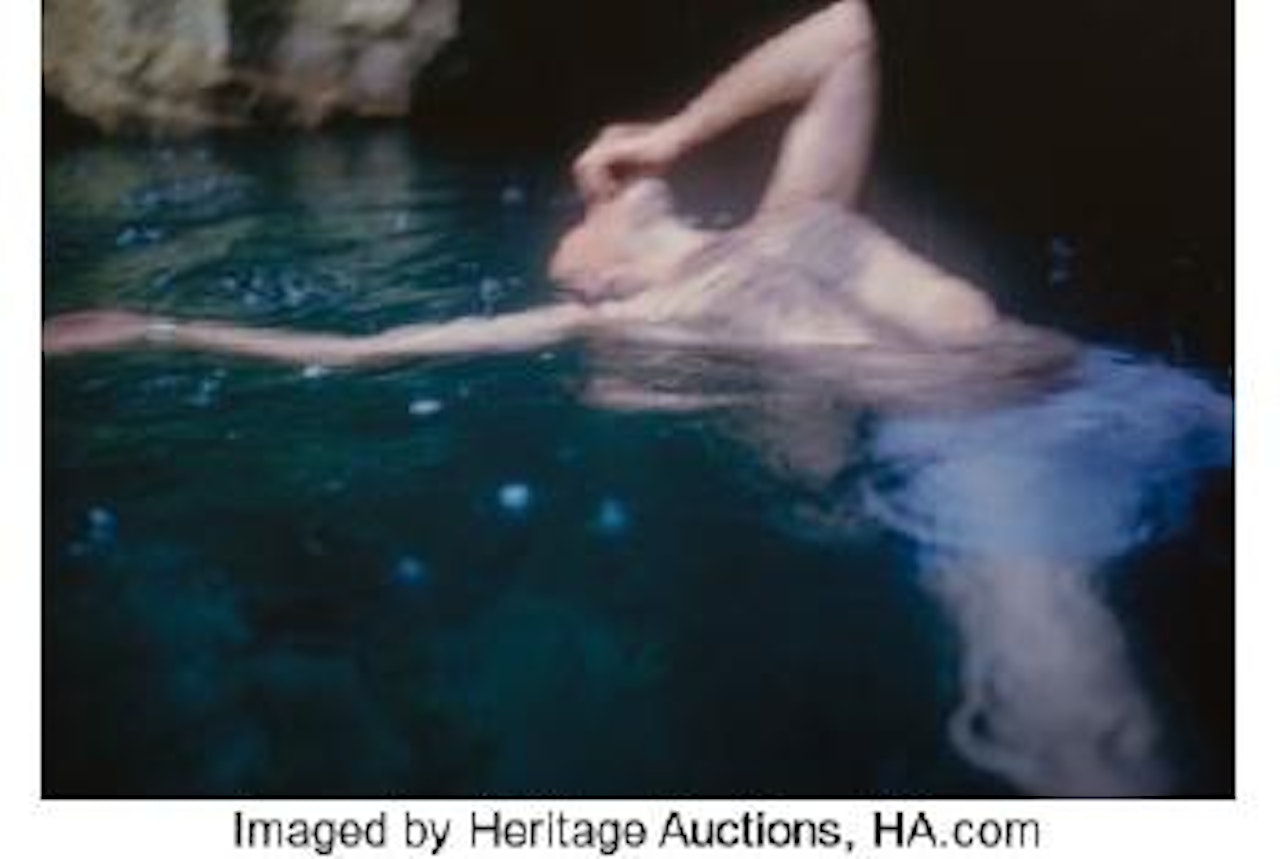 Guido floating, Levanzo, Sicily, 1999 by Nan Goldin