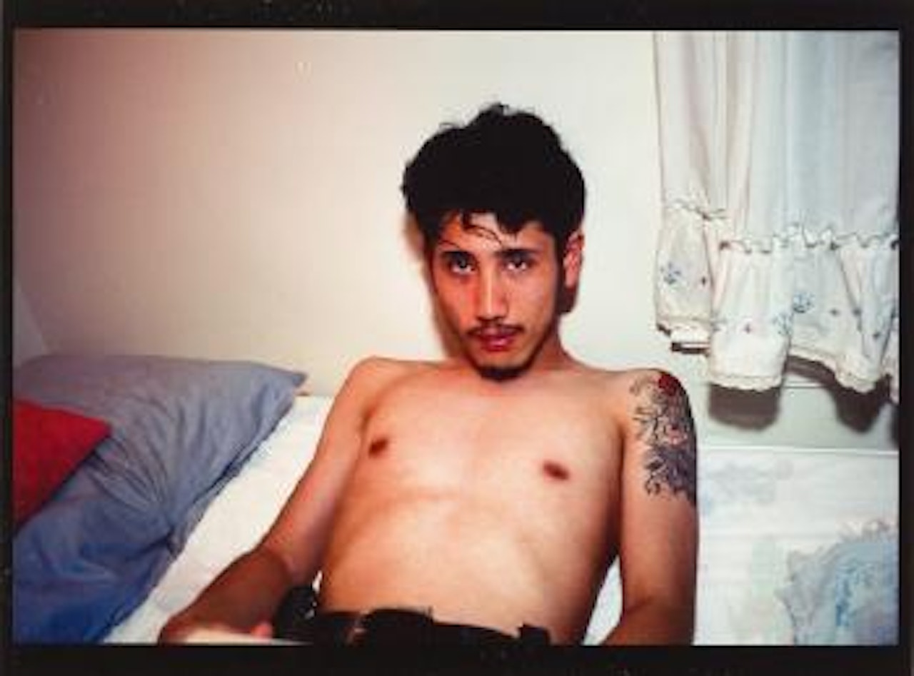 Kee in bed, E.Hampton, N.Y by Nan Goldin