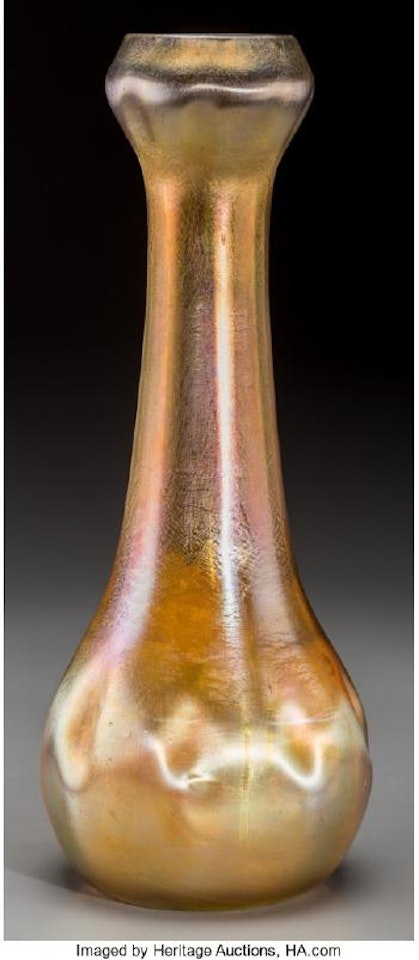 A Tiffany Studios Gold Favrile Glass Dimpled Vase ,
Circa
1908 by Tiffany Studios