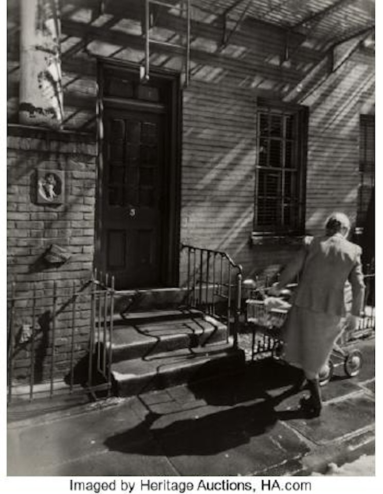 Woman and Baby Carriage in Melting Snow ,
Circa
1948 by Berenice Abbott