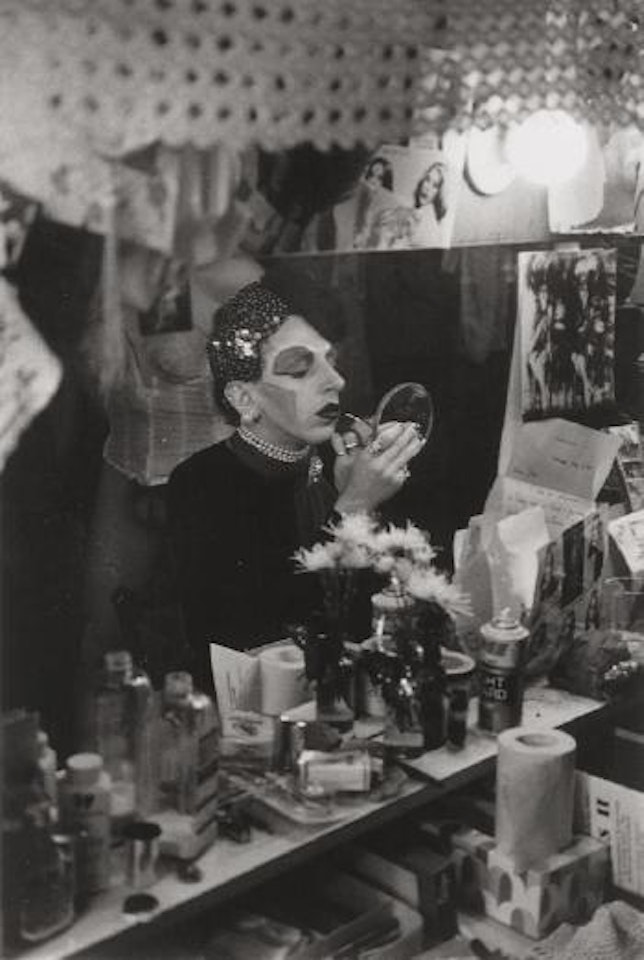 John Heys applying makeup backstage during The Palm Casino Review, Bowery Lane Theatre by Peter Hujar
