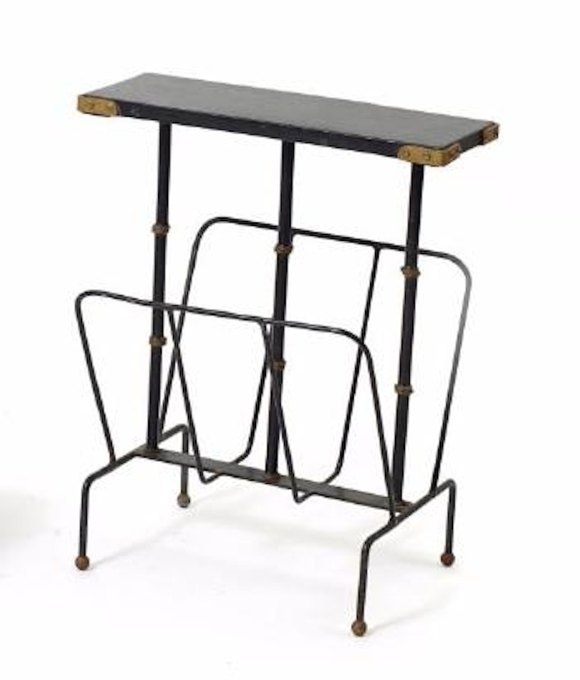 Bout de canapé formant porte-revues ,
Circa
1960 by Jacques Adnet