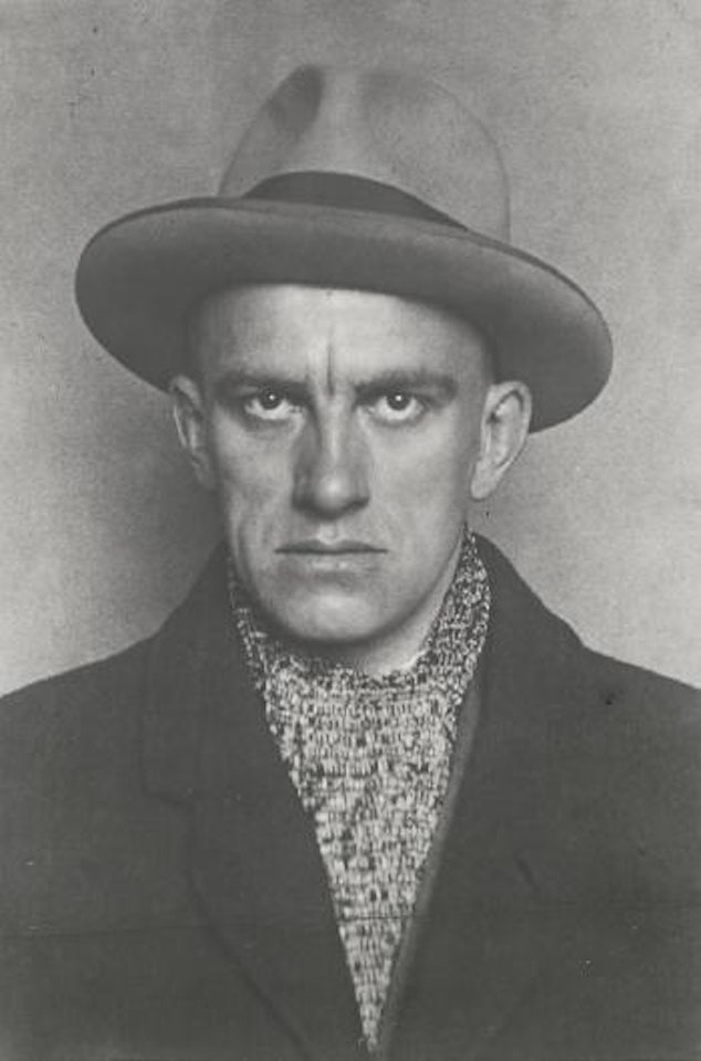 Portrait of Vladimir Mayakovsky (1893 - 1930) in hat and coat ,
1924 by Alexander Rodchenko