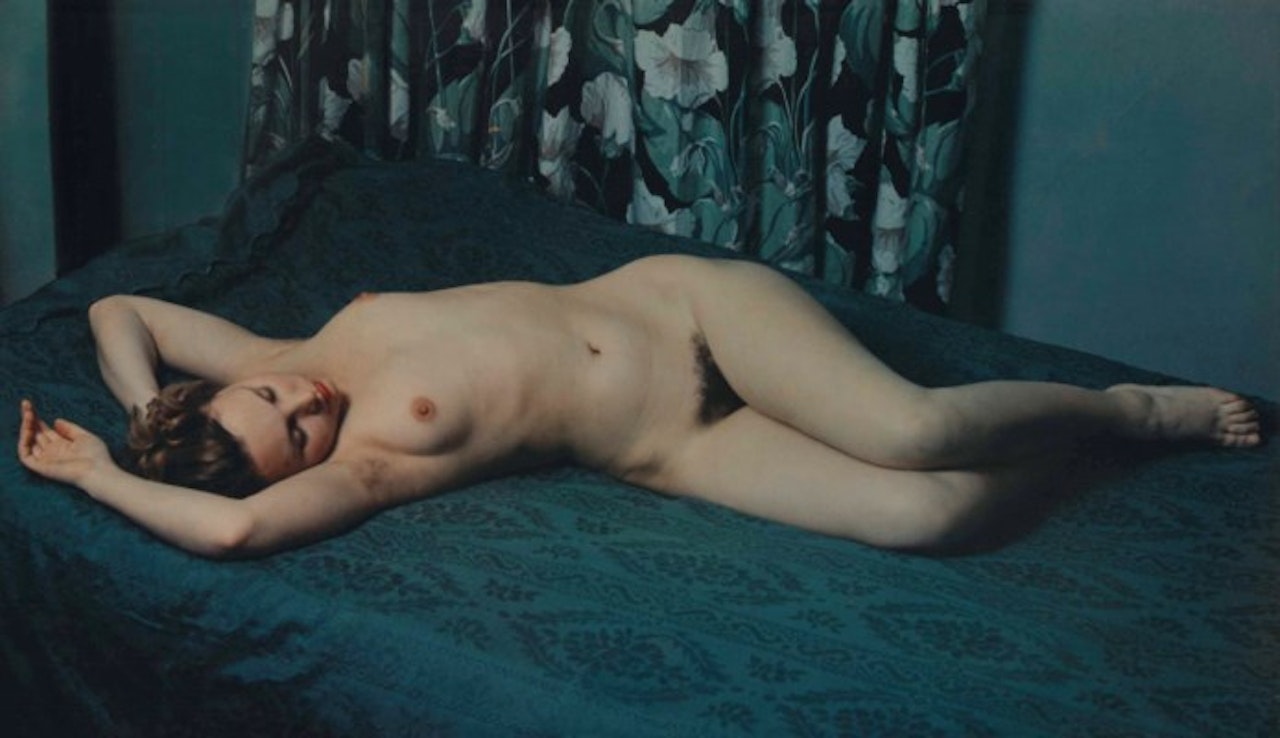 Reclining Nude on Dark Green by Paul Outerbridge