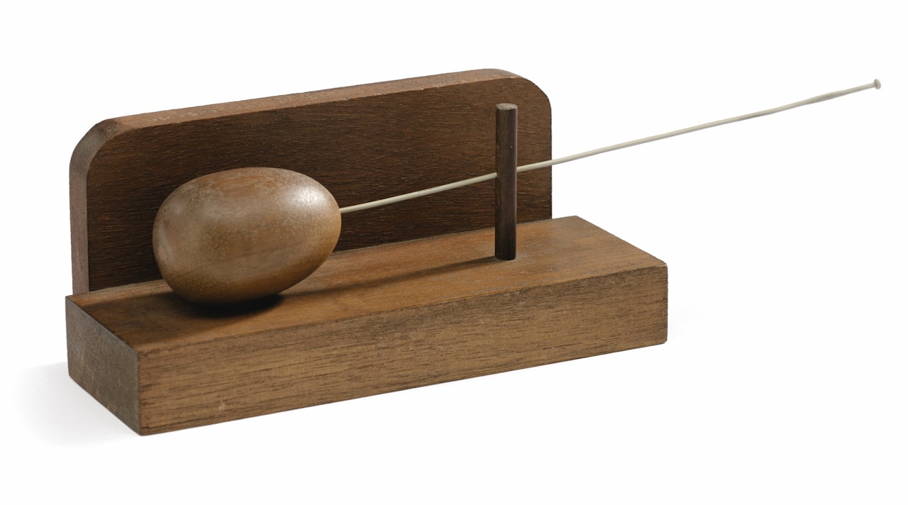 DOMESTICATED EGG by Man Ray
