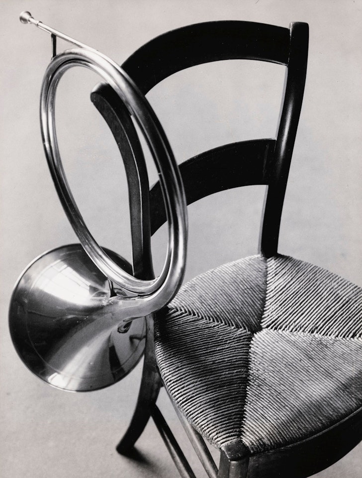CHAIR AND FRENCH HORN, PARIS by André Kertész