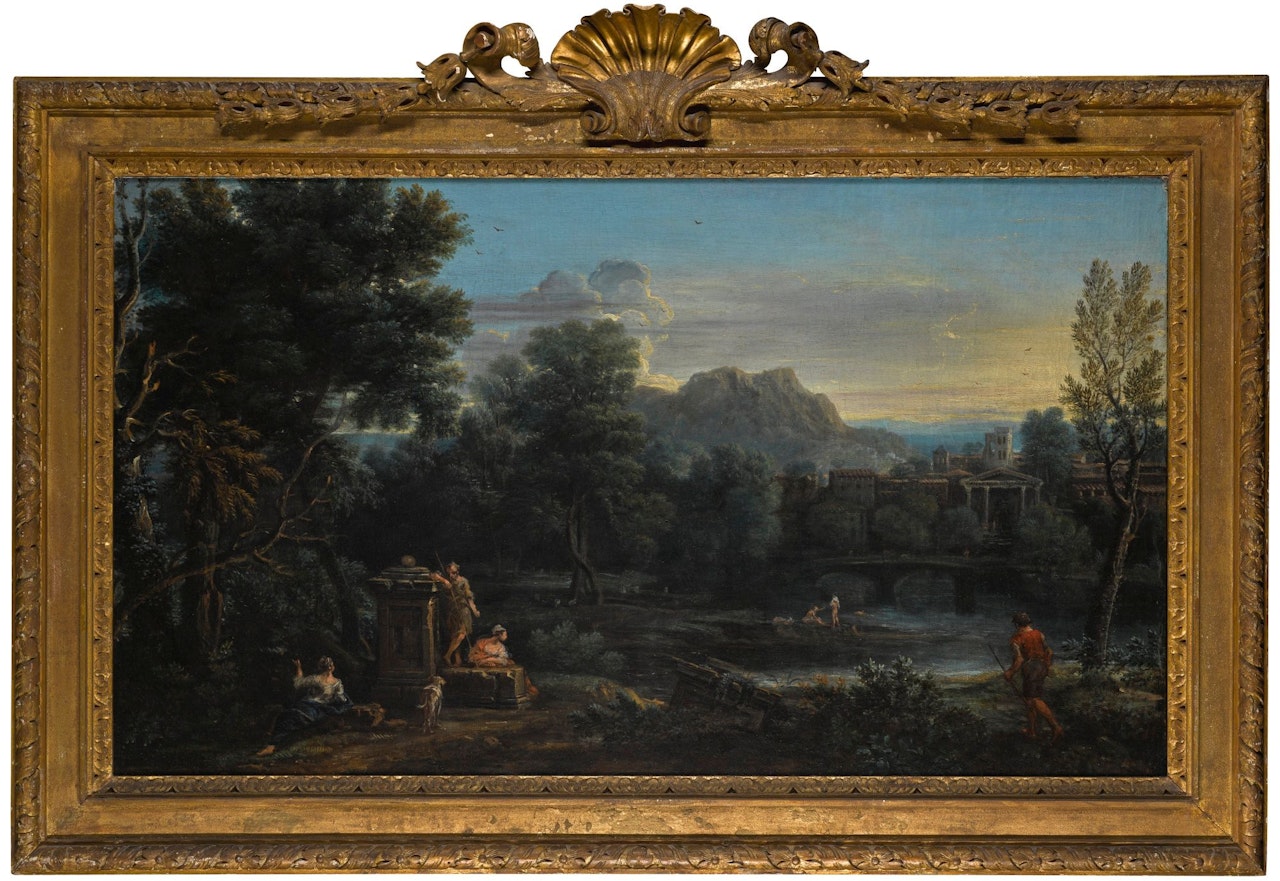 A WOODED CLASSICAL LANDSCAPE WITH FIGURES RESTING IN THE FOREGROUND AND BATHING IN THE RIVER, A TOWN BEYOND by John Wootton