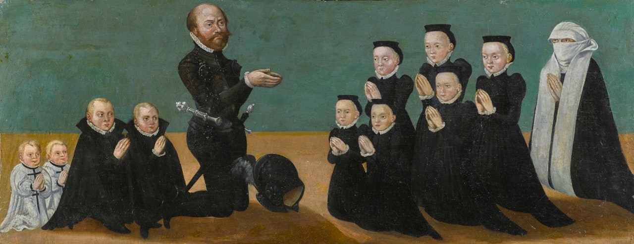 PREDELLA PANEL DEPICTING A KNEELING DONOR WITH HIS WIFE AND THEIR TEN CHILDREN by German School