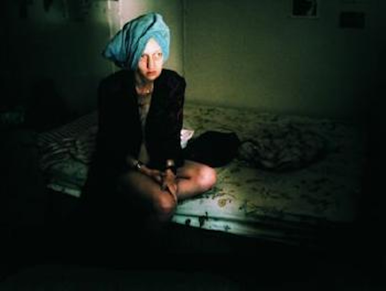 Suzanne on her bed, New York City by Nan Goldin