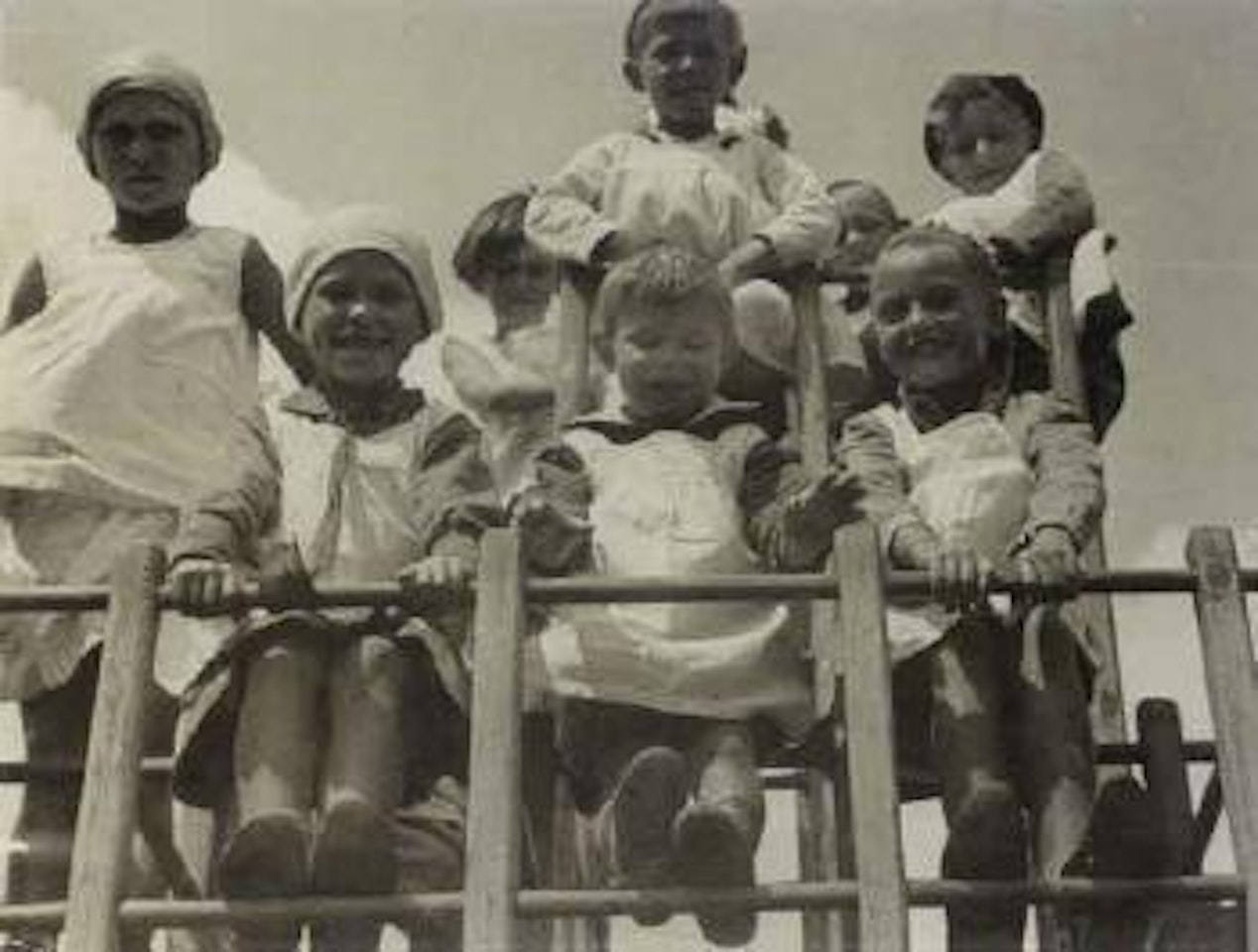 Children's village in Sokolniki Park, children at the climbing wall by Alexander Rodchenko