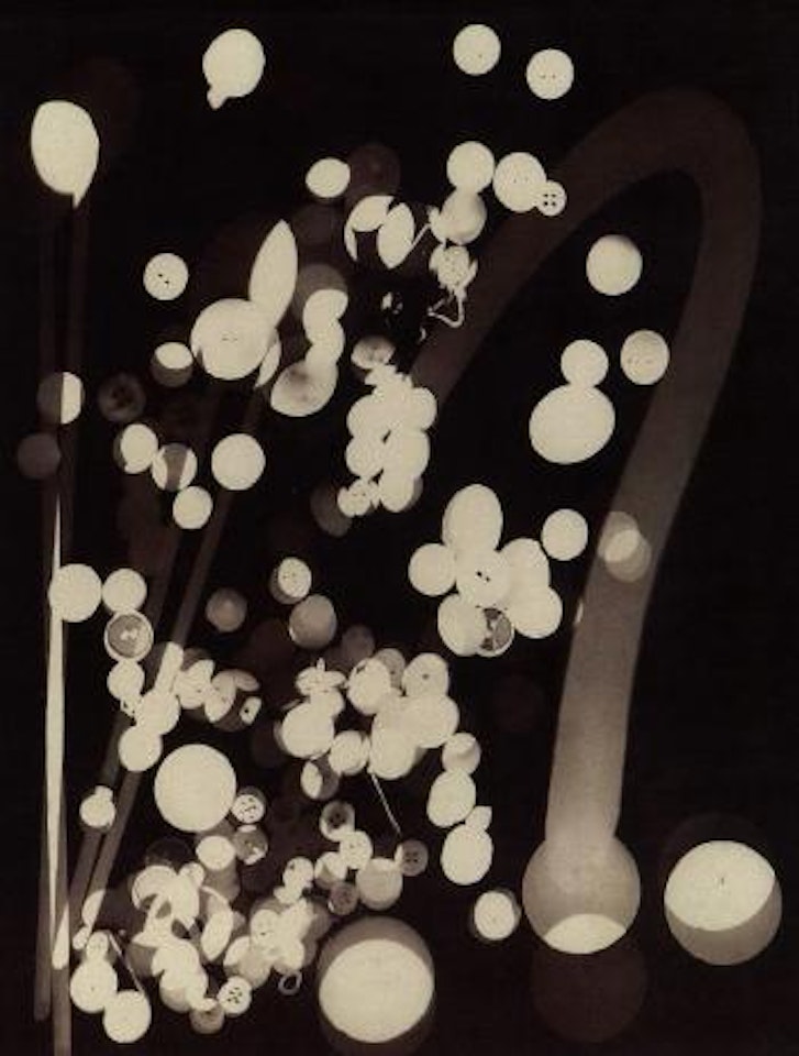 Rayograph with buttons by Man Ray