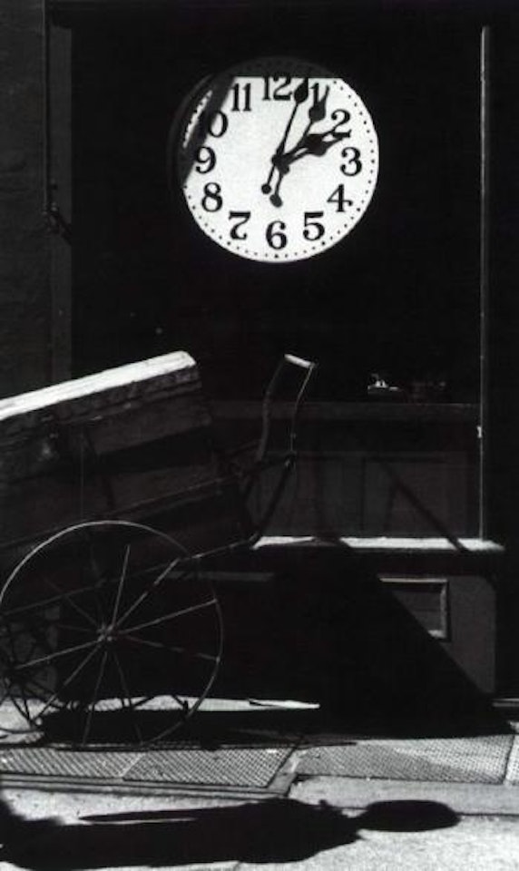 Watchmaker's shop, Christopher Street, New York by André Kertész