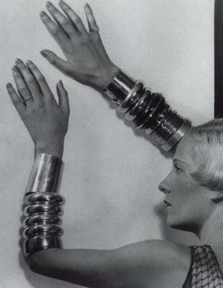 Suzy Solidor wearing Chanel bracelets by Man Ray