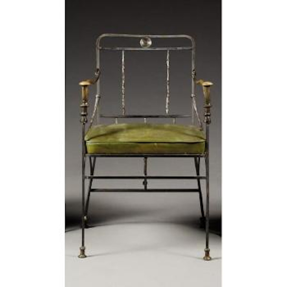Fauteuil aux pommeaux de canne by Diego Giacometti