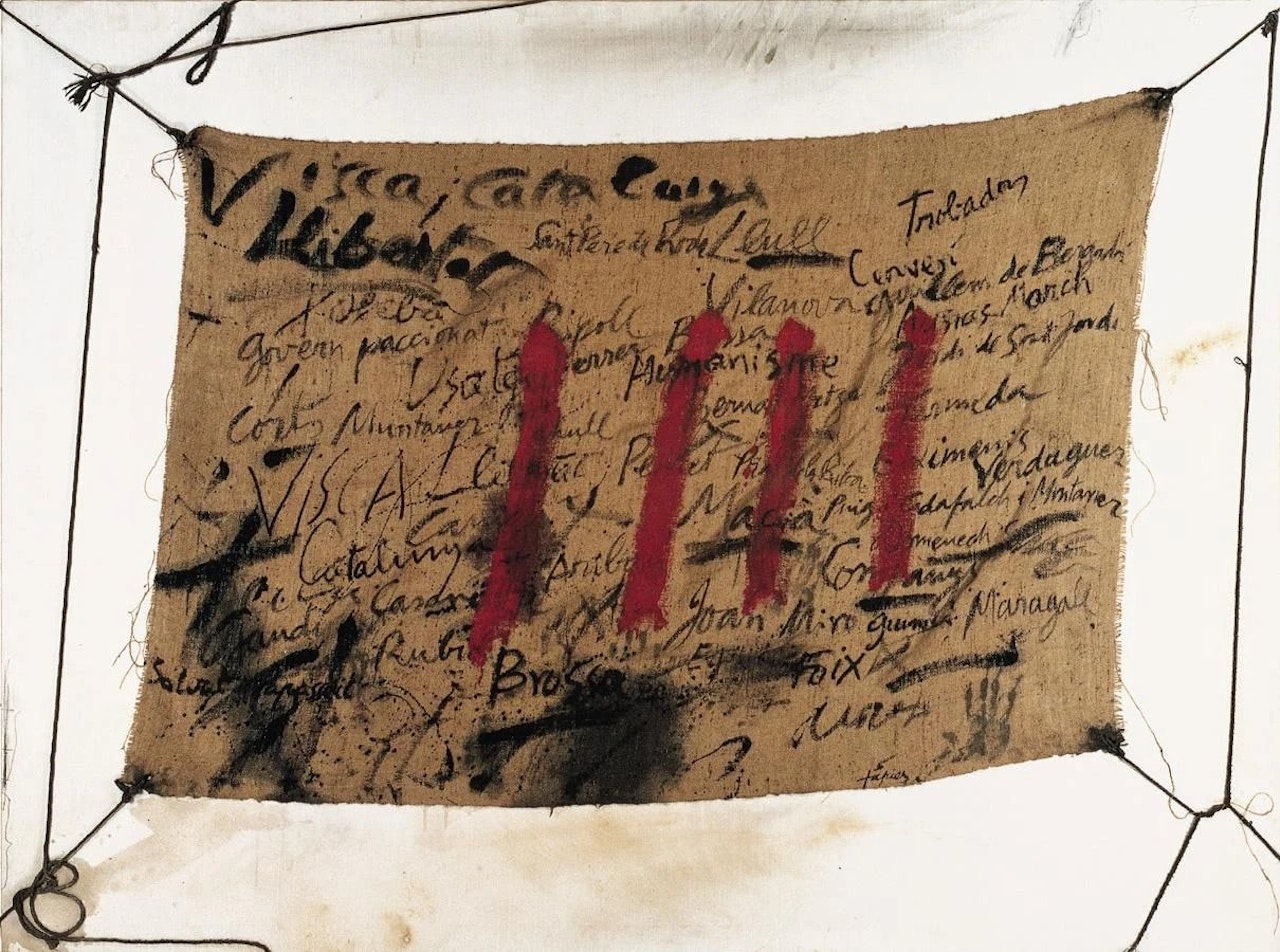 Inscriptions and four strokes on sackcloth by Antoni Tapies