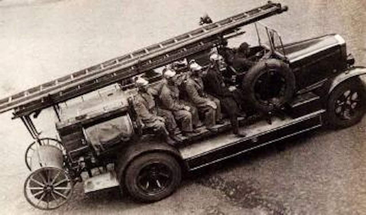 Firemen being dispatched, 1932 by Alexander Rodchenko
