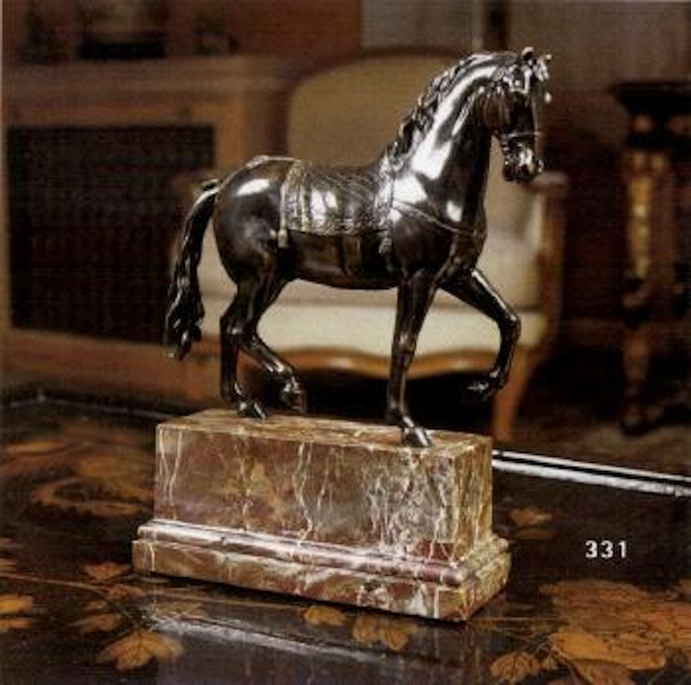 Pacing horse wearing a tassled saddle cloth by French School