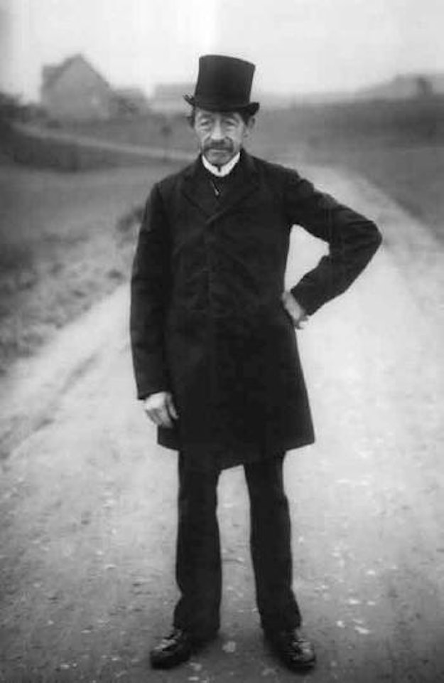 Westphalian farmer on his way to church by August Sander