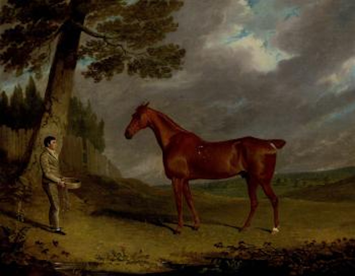 Chestnut hunter and a groom in a landscape by John Frederick Herring