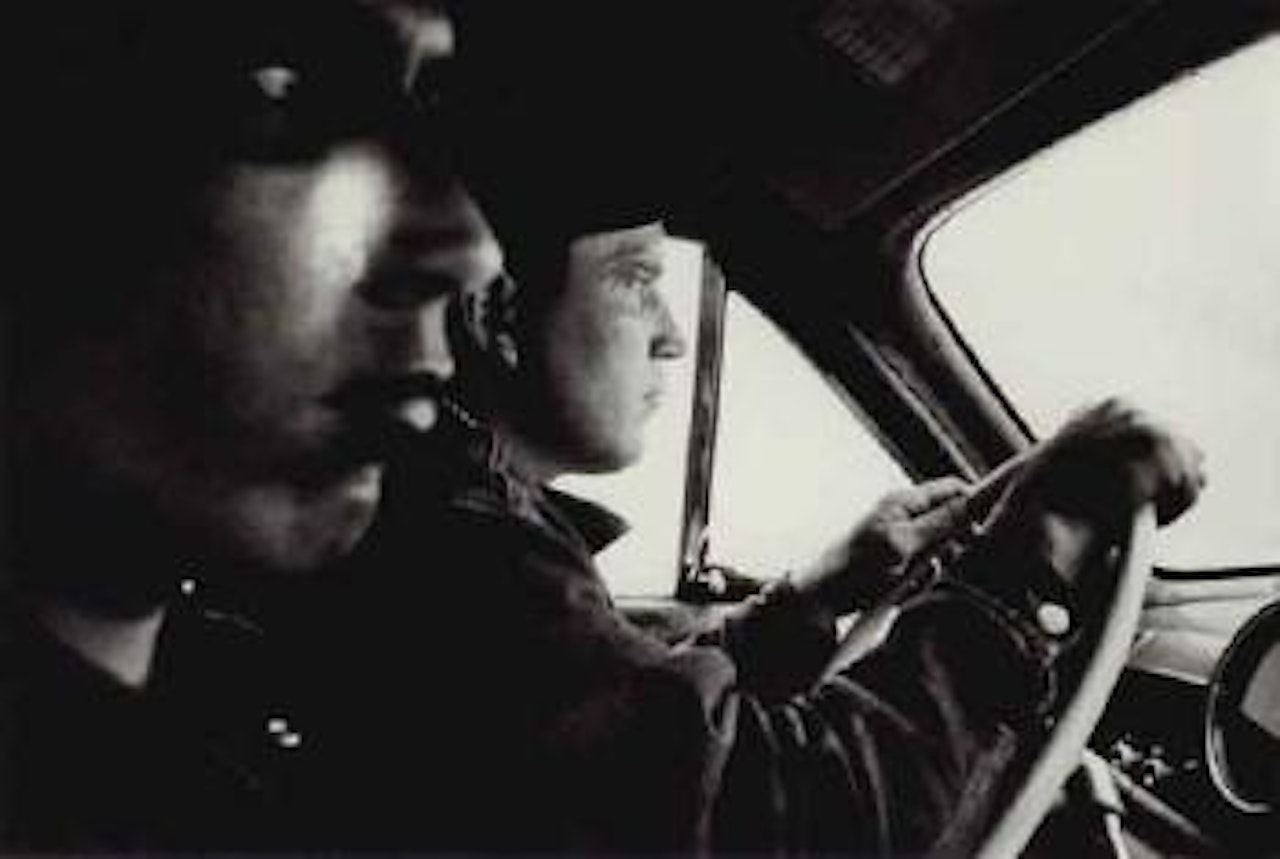 Hitchhikers, going to Butte Montana by Robert Frank