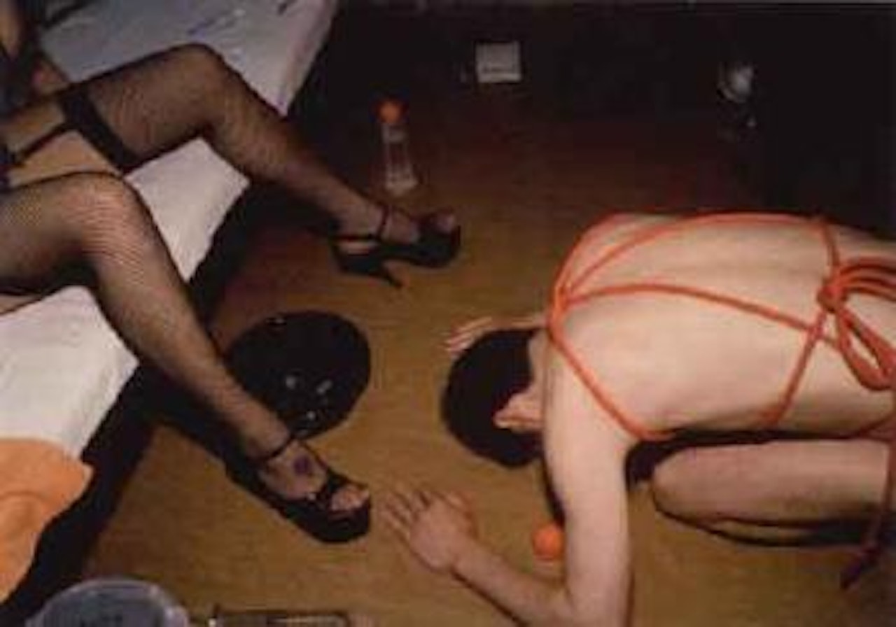 Kana with slave, Tokyo by Nan Goldin