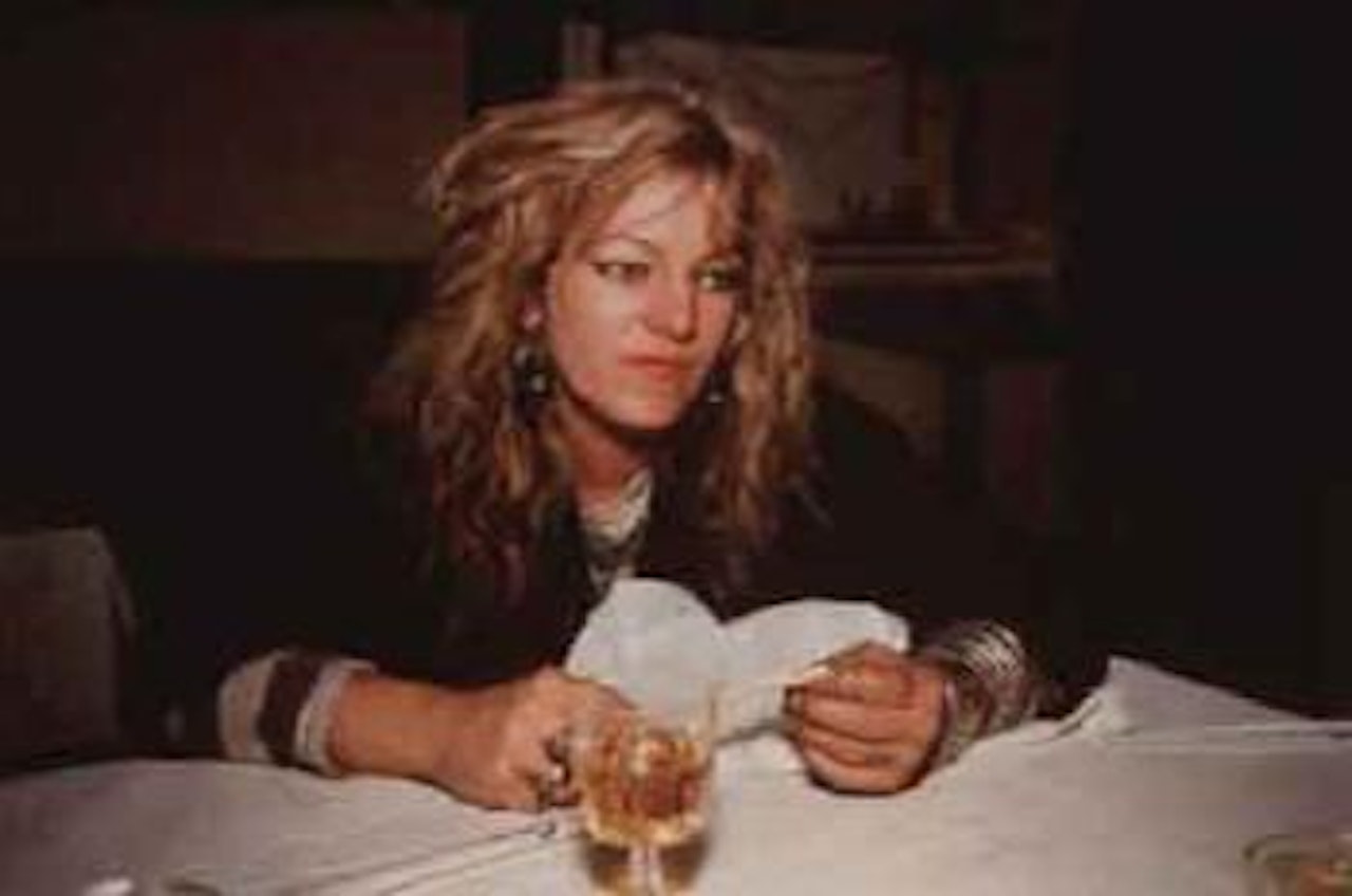 Cookie at a restaurant, Positano by Nan Goldin