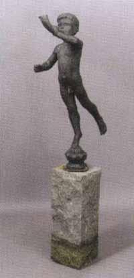 Boy blowing on a horn by Arne Durban