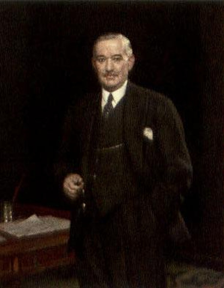 Portrait of H J Mitchell beside a desk by Harold Knight