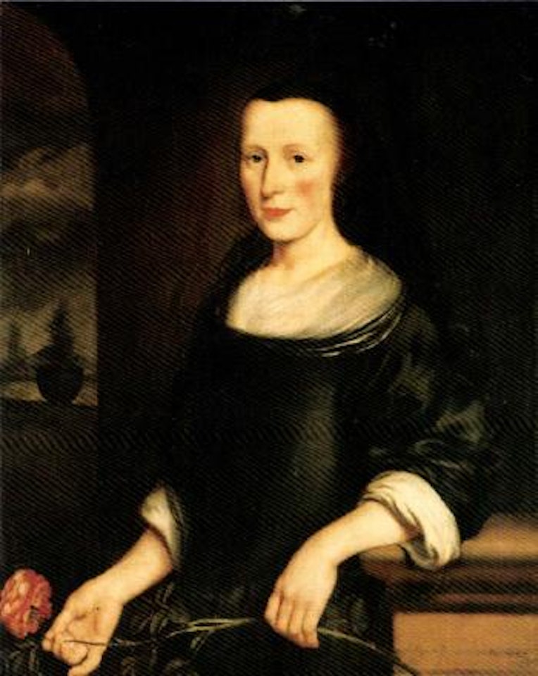 Portrait of a lady, three-quarter length, in a terrace holding a flower by Nicolaes Maes