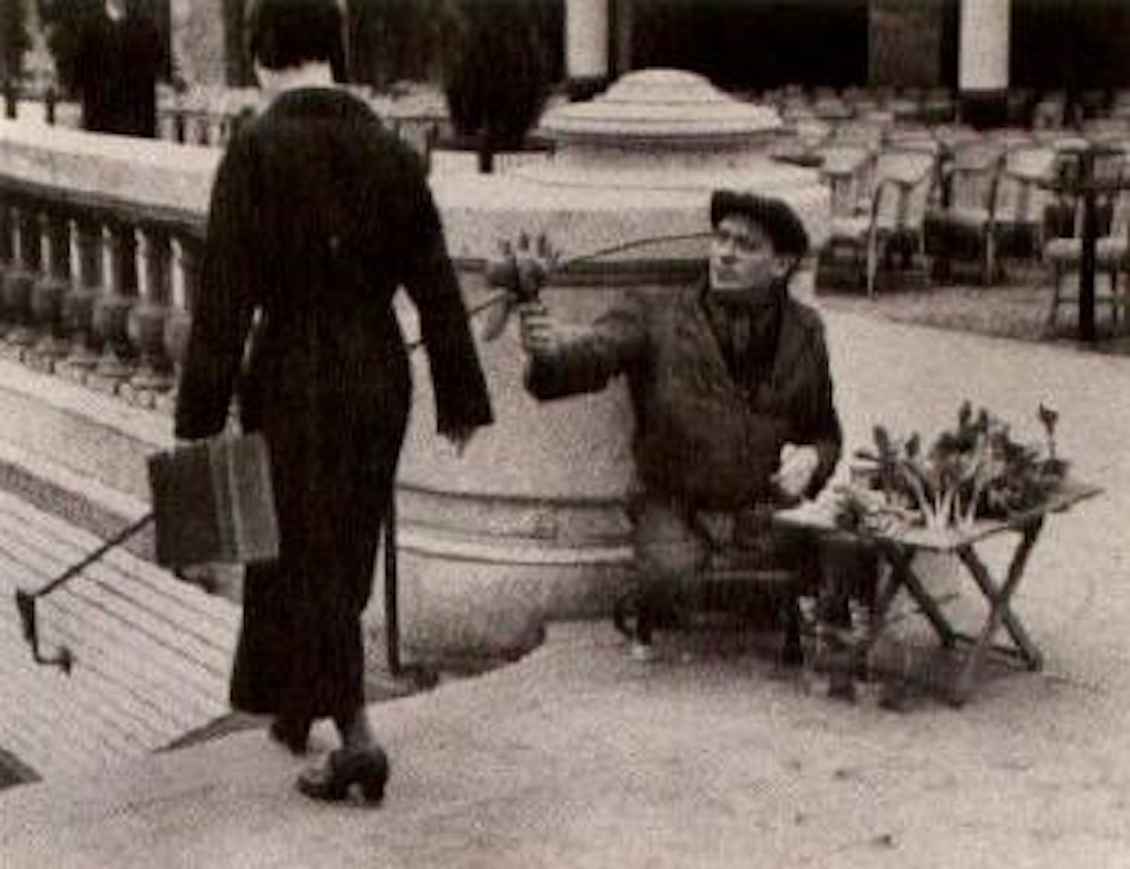 Flower seller, Paris, May by André Kertész