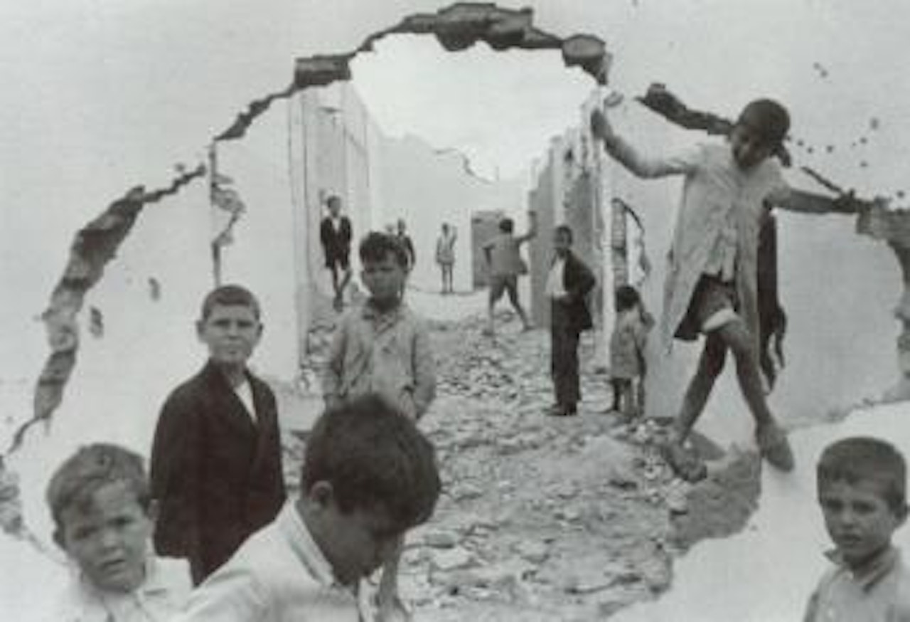 Children playing in the ruins, Seville, Spain by Henri Cartier-Bresson