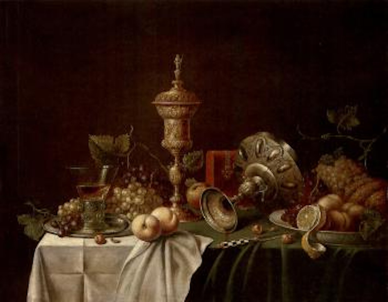 Roemer of wine, silver tazza, fruit on a draped table by Jan Davidsz de Heem