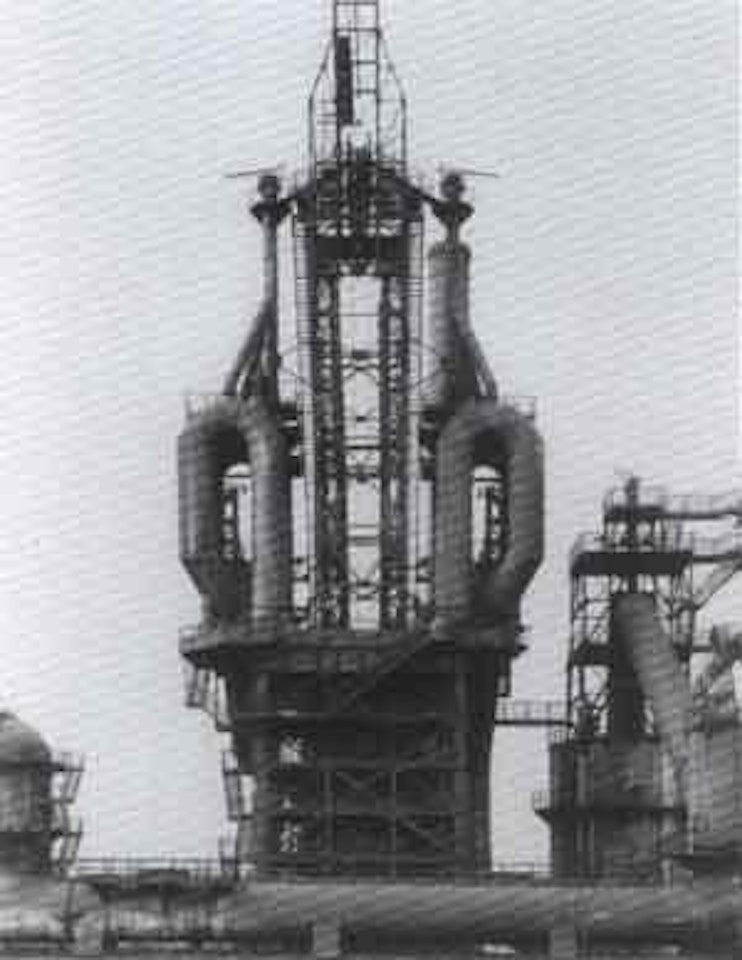 Blast furnace heads C by Bernd & Hilla Becher