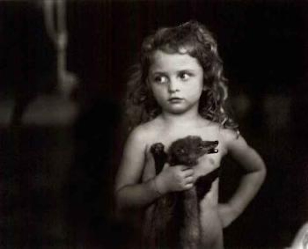 Holding the weasel by Sally Mann