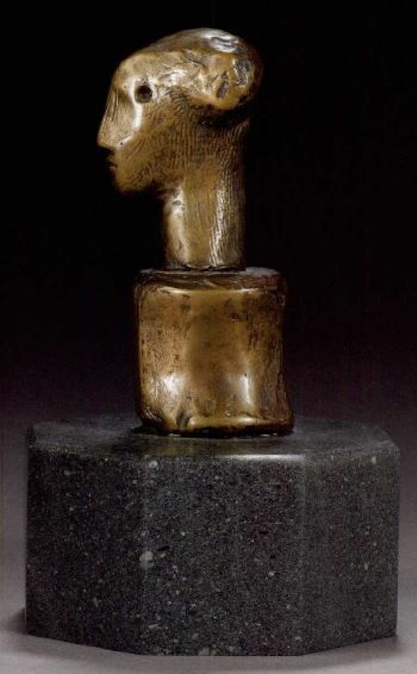 Head on a bone base by Henry Moore