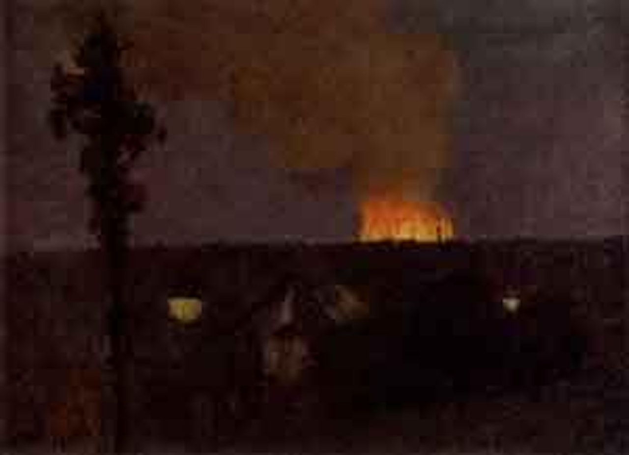 The city ablaze by Norman Garstin