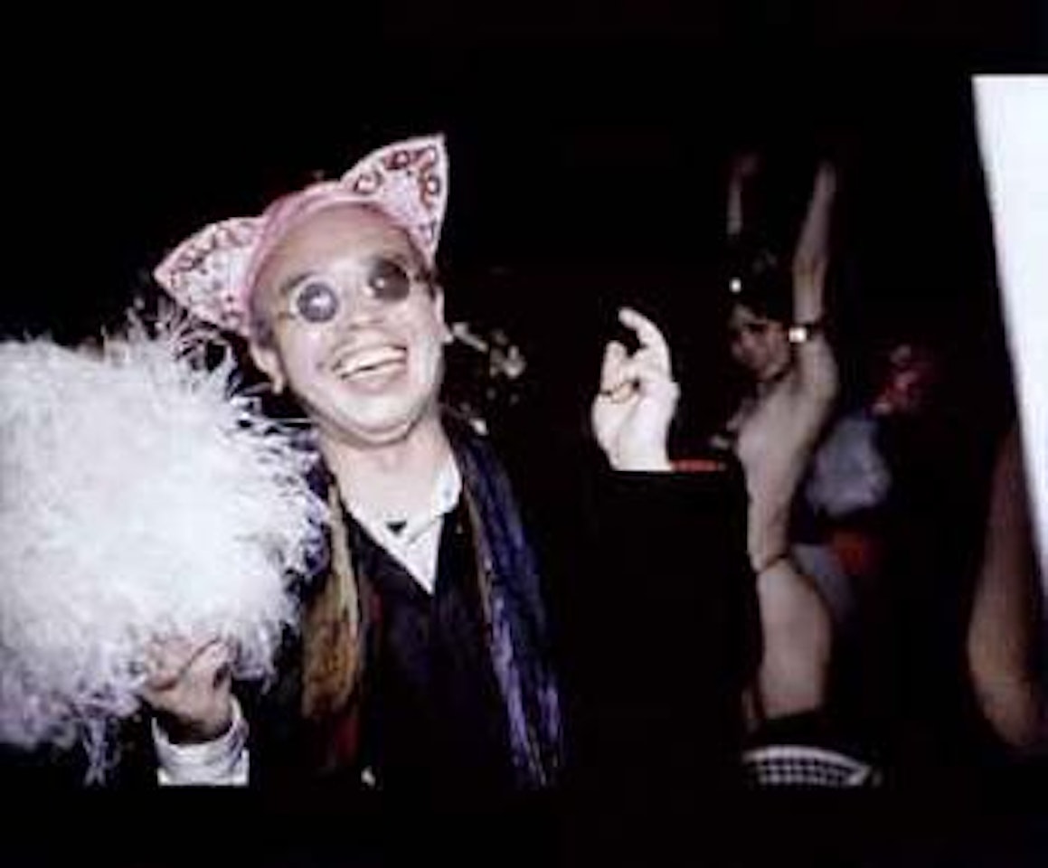 Araki dancing at strip bar, Tokyo by Nan Goldin