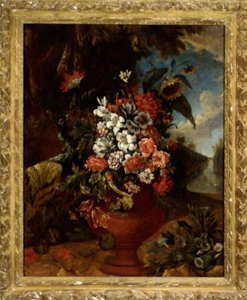 Lilies, sunflowers and other flowers in an urn, in a wooded landscape by Franz Werner von Tamm