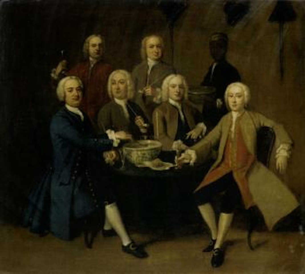 Gentlemen drinking and smoking pipes round a table in an interior by English School