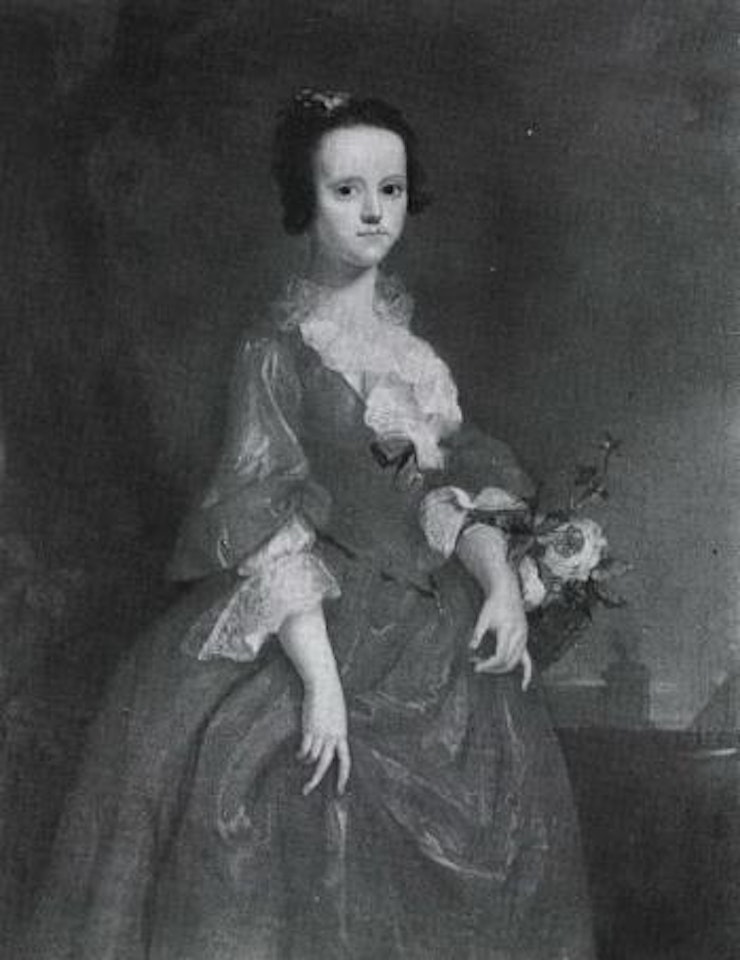 Portrait of lady standing, wearing a yellow dress and holding a basket of flowers by Thomas Hudson