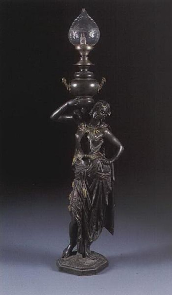 Figure of Indian woman torcher wearing jacket and drapery, holding urn by French School