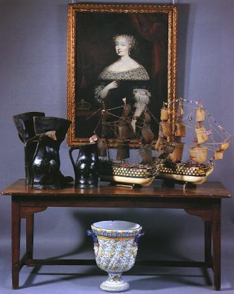 Portrait of queen standing wearing black dress with lace collar and sleeves, regalia on table by German School