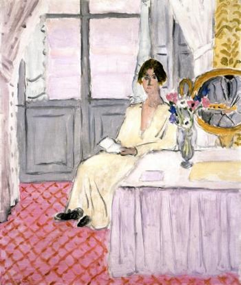 Femme lisant devant une table et bouquet, Nice by Henri Matisse