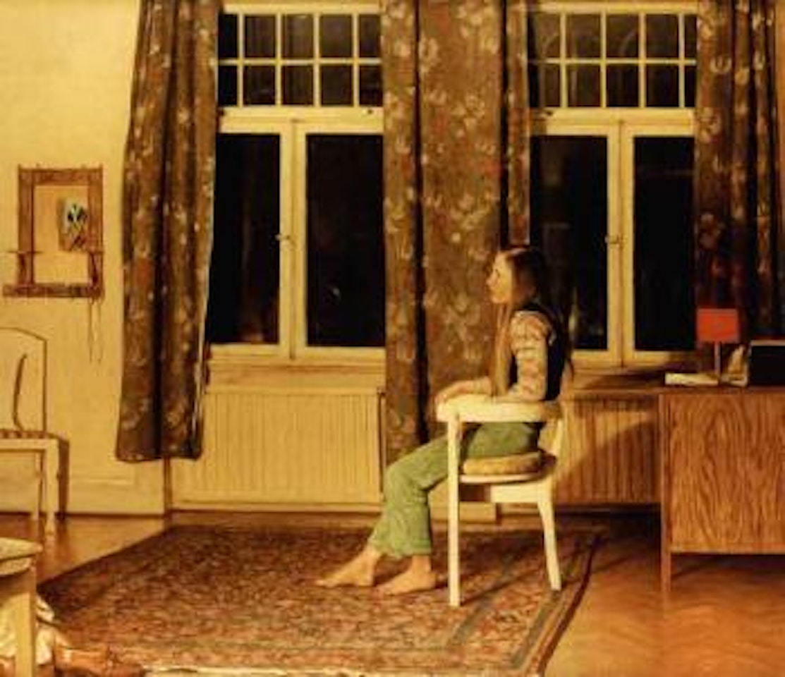 In the town II - girl seated in interior by Ola Billgren