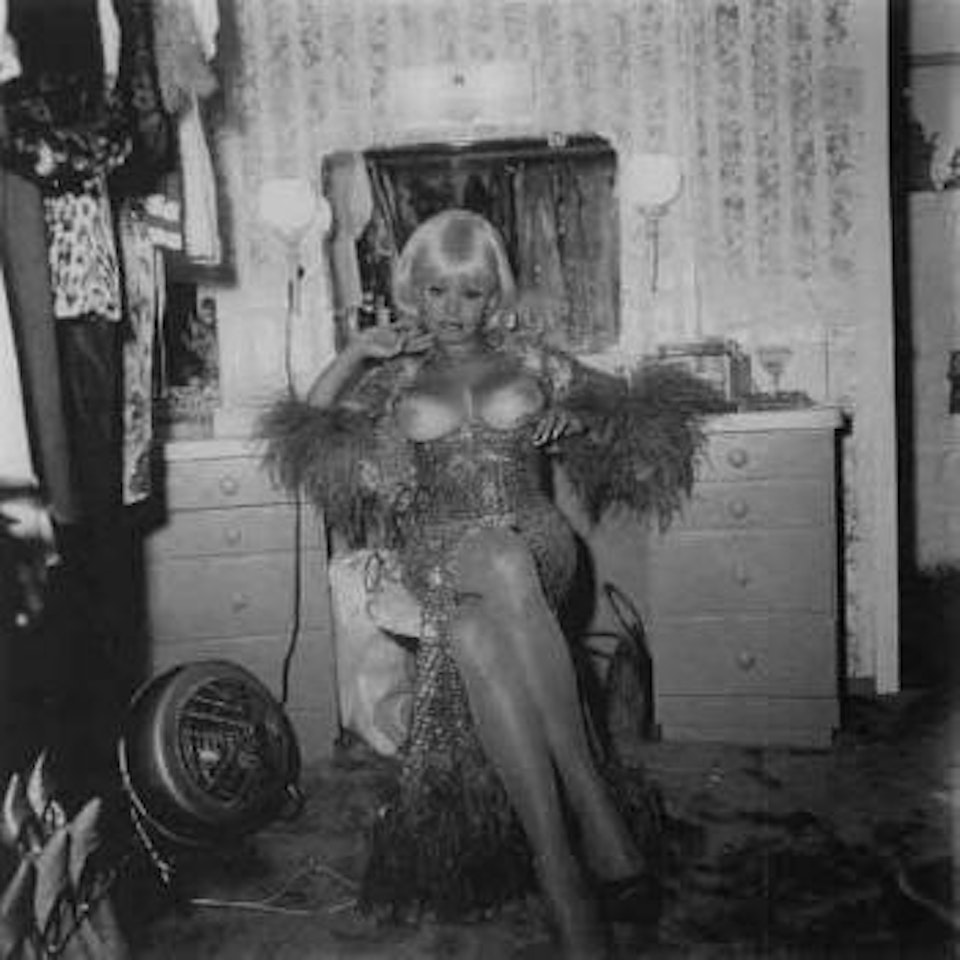 Topless dancer in her dressing room, San Francisco, Cal by Robert Frank
