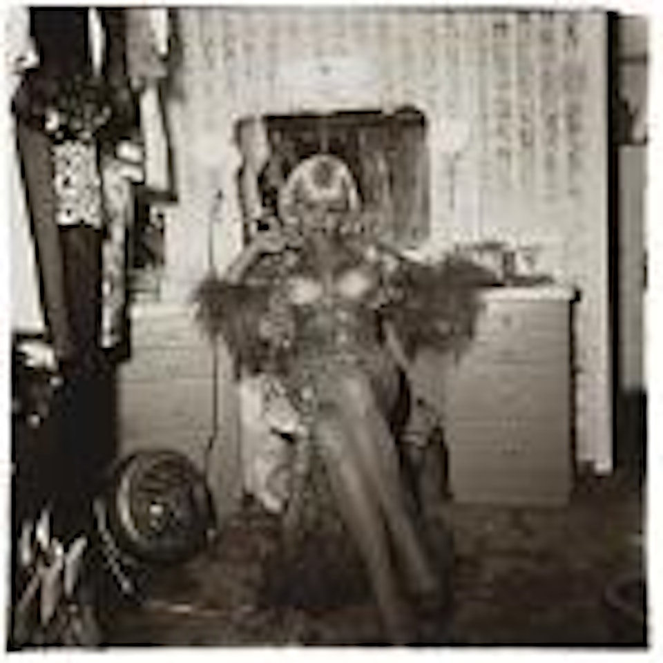 Topless dancer in her dressing room, San Francisco, Ca by Diane Arbus by Neil Selkirk