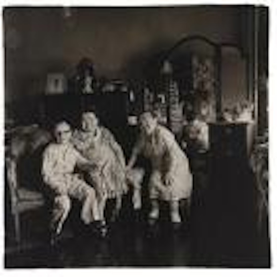 Russian midmet friends in a living room on 100th St.N.Y.C by Diane Arbus by Neil Selkirk