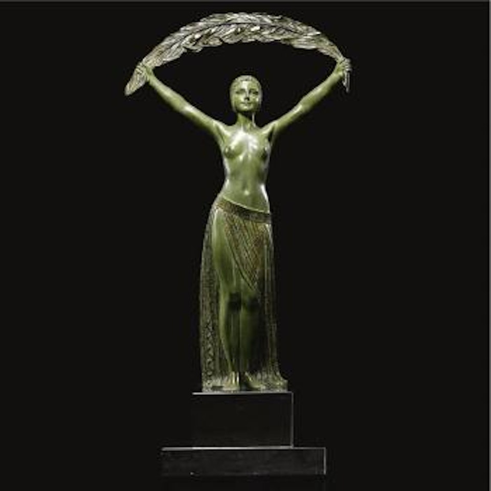 Woman with palm by Demetre Chiparus