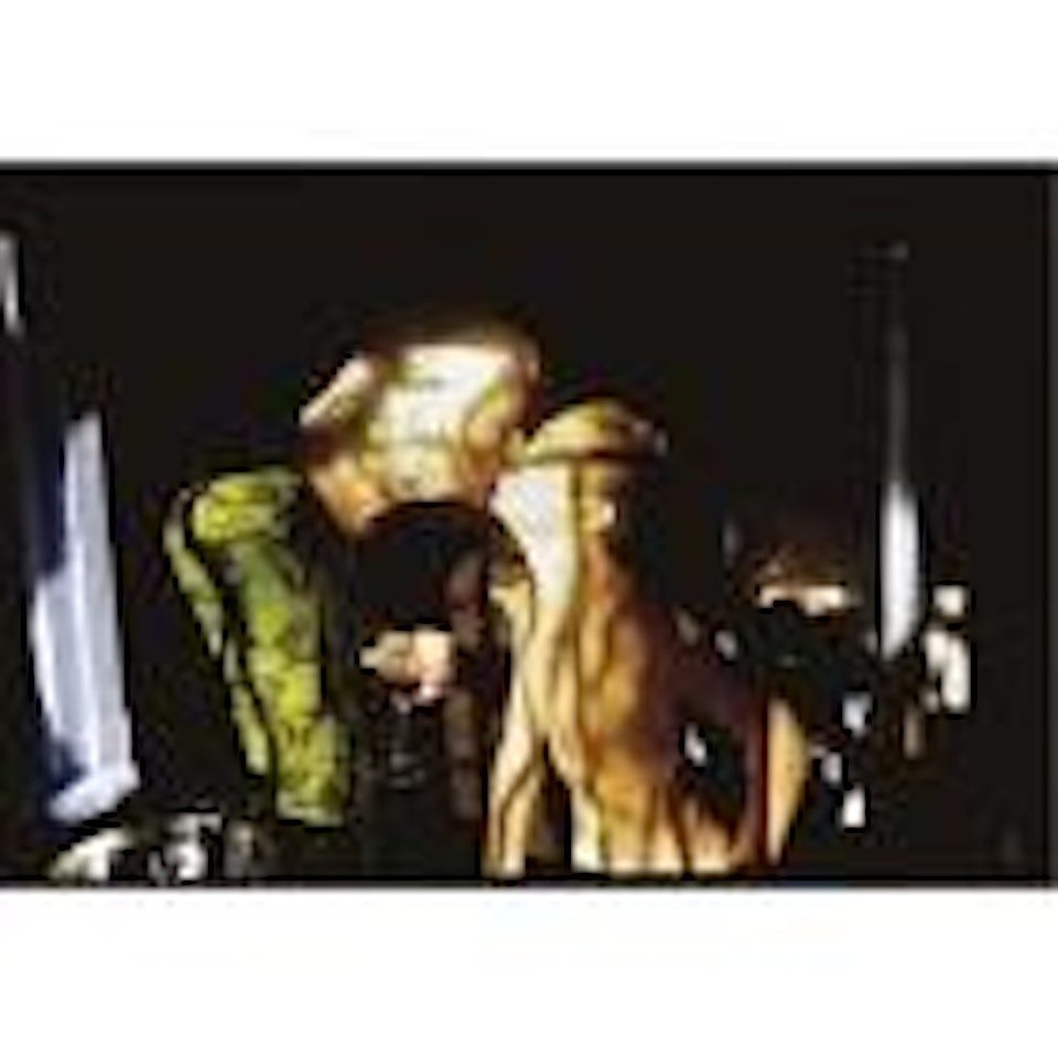 Mel kissing his grandmother Chris, St. Remy 2002 by Nan Goldin